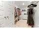 Spacious walk-in closet featuring ample storage, shelving, and hanging space for organized clothing and accessories at 1180 Trident Maple, Lawrenceville, GA 30045