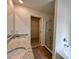 Bathroom features a double sink vanity, soaking tub, walk-in shower, and walk-in closet at 1964 Asher Ln # 47, Conyers, GA 30013