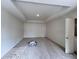 Bright primary bedroom with tray ceilings, plush carpets, and backyard views at 1964 Asher Ln # 47, Conyers, GA 30013