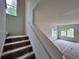 Bright entryway featuring a carpeted staircase and lots of natural light at 1964 Asher Ln # 47, Conyers, GA 30013