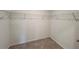 Empty walk-in closet featuring plush carpets and wire shelving at 1964 Asher Ln # 47, Conyers, GA 30013
