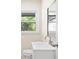 Bright bathroom with a large mirror and window providing natural light at 2805 Long Way, Decatur, GA 30032