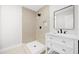 Walk-in shower and vanity with white cabinets and a modern mirror create an inviting bathroom space at 2805 Long Way, Decatur, GA 30032