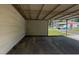 Spacious carport area providing covered parking and protection from the elements at 50 Ivy St, Porterdale, GA 30014