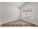 Spacious bedroom with vaulted ceilings, large windows, and modern flooring at 5863 Landers Loop, Fairburn, GA 30213