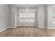 Bright bedroom with large windows and modern flooring at 5863 Landers Loop, Fairburn, GA 30213