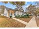 Charming single-story home with manicured landscaping and inviting front porch at 5863 Landers Loop, Fairburn, GA 30213