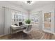Bright flexspace features a computer desk, rolling chair, and multiple windows at 5863 Landers Loop, Fairburn, GA 30213