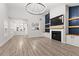 Bright open-concept living room features fireplace and abundant natural light at 5863 Landers Loop, Fairburn, GA 30213