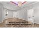 Massive primary bedroom features custom trey ceiling and uplighting at 5863 Landers Loop, Fairburn, GA 30213