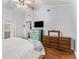 Spacious bedroom with hardwood floors, vaulted ceiling, and stylish furnishings at 103 Campground School Rd, Dallas, GA 30157