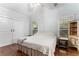 Cozy bedroom with hardwood floors, windows, and a large closet at 103 Campground School Rd, Dallas, GA 30157
