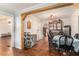 Cozy dining room with hardwood floors and views into the living room at 103 Campground School Rd, Dallas, GA 30157