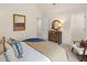 Bright bedroom with comfortable furniture, decor, and closet access at 115 Maplewood Ln, Conyers, GA 30094