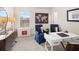 Cozy bedroom with a desk area, complete with furniture and modern decor at 115 Maplewood Ln, Conyers, GA 30094