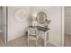 Well lit area with desk, mirror, and decor at 115 Maplewood Ln, Conyers, GA 30094