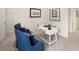 Cozy bedroom with a desk area, complete with furniture and modern decor at 115 Maplewood Ln, Conyers, GA 30094