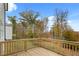 Wooden deck offers an outdoor area with views of wooded area at 115 Maplewood Ln, Conyers, GA 30094