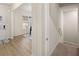 Hallway featuring access to the upper and lower levels of the home at 115 Maplewood Ln, Conyers, GA 30094