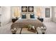 Comfortable main bedroom with a cozy bed and neutral decor at 115 Maplewood Ln, Conyers, GA 30094