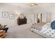 Inviting main bedroom featuring a full length mirror at 115 Maplewood Ln, Conyers, GA 30094