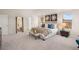 Bright main bedroom featuring a king bed and lots of closet space at 115 Maplewood Ln, Conyers, GA 30094