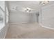 Light-filled bedroom features a tray ceiling, ceiling fan, and large windows at 1215 Comet View Se Trl, Smyrna, GA 30082