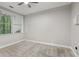 Neutral bedroom with a window, carpeted floor and plenty of natural light at 1215 Comet View Se Trl, Smyrna, GA 30082