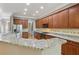 Well-equipped kitchen featuring granite countertops, stainless steel appliances, and ample cabinetry at 1215 Comet View Se Trl, Smyrna, GA 30082
