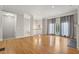 Bright living room showcasing hardwood floors, fireplace, and balcony access at 1215 Comet View Se Trl, Smyrna, GA 30082