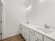 Bright bathroom featuring a double sink vanity with modern fixtures and a white countertop at 208 Sharon Ln, Loganville, GA 30052