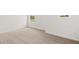 Bedroom with neutral carpet, white walls, and natural light from a window at 208 Sharon Ln, Loganville, GA 30052