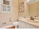 This bathroom features a shuttered window, a toilet, a single sink, and decoration at 435 Trammell Dr, Alpharetta, GA 30009