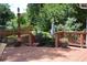 Inviting deck with wooden railings and potted flowers, perfect for enjoying the serene backyard views at 435 Trammell Dr, Alpharetta, GA 30009
