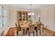 Dining room featuring a wooden table with seating for six and traditional decor at 435 Trammell Dr, Alpharetta, GA 30009