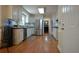 Spacious kitchen featuring stainless steel appliances, hardwood floors, and white cabinets at 435 Trammell Dr, Alpharetta, GA 30009