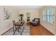 Bright office space with hardwood floors, plantation shutters, and a chaise lounge at 435 Trammell Dr, Alpharetta, GA 30009