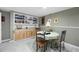 Basement featuring wood-look cabinets, a table, and carpet with neutral-colored walls at 55 Cross Pointe Ct, Hiram, GA 30141