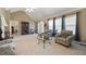 Spacious living room with vaulted ceilings, fireplace, tile flooring, and lots of natural light at 55 Cross Pointe Ct, Hiram, GA 30141