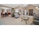 Open living room with lots of natural light, neutral paint, and glass coffee table at 55 Cross Pointe Ct, Hiram, GA 30141