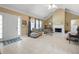 Spacious living room with vaulted ceilings, fireplace, tile flooring, and lots of natural light at 55 Cross Pointe Ct, Hiram, GA 30141