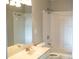 Well lit bathroom with vanity, mirror, soaking tub, shower, and toilet at 601 Hexham Ct, Suwanee, GA 30024