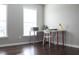 Bright room features hardwood floors, a white desk, and a large window at 601 Hexham Ct, Suwanee, GA 30024