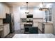 Well-appointed kitchen with stainless steel appliances, ample counter space, and classic cabinetry at 601 Hexham Ct, Suwanee, GA 30024