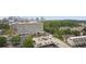 Aerial view showcases the parking and surrounding buildings of the condo complex at 1820 Peachtree Nw St # 1110, Atlanta, GA 30309