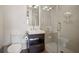 The bathroom provides a modern sink and glass-enclosed shower with tile surround at 1820 Peachtree Nw St # 1110, Atlanta, GA 30309