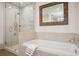 This relaxing bathroom boasts a large soaking tub, separate shower, and neutral tones at 1820 Peachtree Nw St # 1110, Atlanta, GA 30309