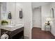Stylish bathroom featuring a modern vanity, mirror, and neutral walls, complemented by modern fixtures at 1820 Peachtree Nw St # 1110, Atlanta, GA 30309