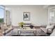 Stylish living room featuring designer furnishings and natural light at 1820 Peachtree Nw St # 1110, Atlanta, GA 30309