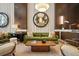 Beautiful lobby area with elegant seating, decor and a large mirror enhancing the sophisticated atmosphere at 1820 Peachtree Nw St # 1110, Atlanta, GA 30309